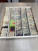 Top view of five-row storage box filled with NASCAR trading cards