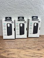 Front view of three Pelican Protector case boxes