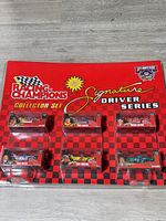 Front view of sealed Racing Champions Signature Driver Series Collector Set showing all four cars