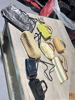 Overview of all purses laid out on table