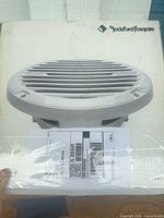 Factory box showing Rockford Fosgate branding and product image