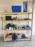 Full view of metal shelving unit with all contents visible