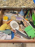 Drawer overview showing full assortment of kitchen utensils