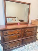 Front view of dresser with mirror