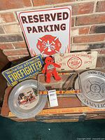 Full lot showing all firefighter signs, plates, plush bear and extinguisher