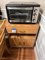 Toaster oven on stand showing full exterior