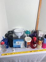 Overall view of pitcher, filter box and assorted bottles/tumblers