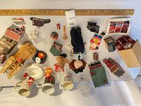 Full layout of all toys, buildings, mugs, doll and ornaments
