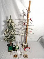 Overall view of two trees, ornaments, figurine