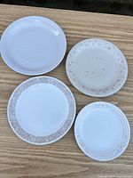 Four plates front view showing patterns and sizes