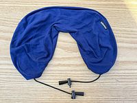 Front view of navy fillable neck pillow cover with drawcord