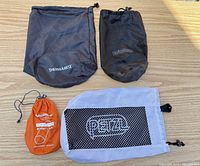 All four branded stuff sacks laid flat on tabletop