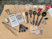 All items arranged on surface showing full lot