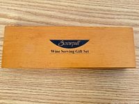 Closed wood presentation box with Screwpull logo