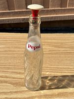 Full view of shaker front showing Pepsi label and bottle form