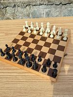 Chess board open with pieces set up