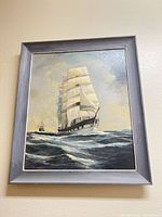 Full view of framed acrylic seascape painting on wall