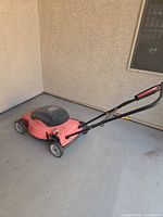 Left side view of Black & Decker Lawn Hog mower with handle folded