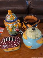 Group shot of all four ceramic pieces on table