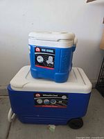 Both Igloo coolers stacked, labels visible