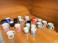 Full group of all mugs displayed on table
