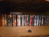 Entire shelf of roughly 40 DVD cases