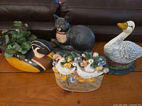 Group shot showing all four animal décor pieces together