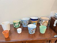 Group view of all nine planters on tabletop