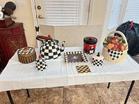 Full lot overview on table showing all seven ceramic pieces