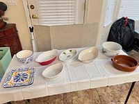 Overview of all eight dishes on table