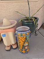 All three planters together showing relative sizes and colours