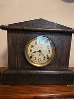Front view of Seth Thomas wood mantel clock