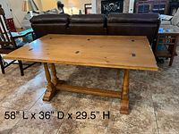 Table fully expanded showing top surface and dimensions text overlay