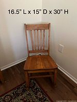 front view of oak rocking chair, dimensions overlay