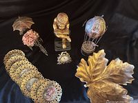 Group shot of all items on black fabric