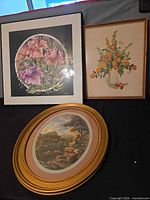 Three framed artworks group shot