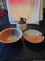 Full set: two bowls and jug displayed