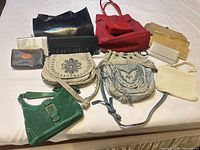 Group shot of all 11 bags and purses