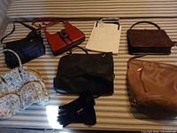 Overview of all handbags, pouches and gloves