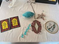 Group shot of all stained glass pieces laid on table