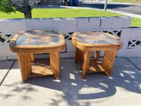 Front view of both light oak end tables with glass tops