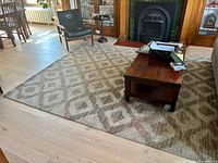 Full view of rug in room showing overall size and pattern