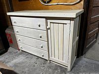 Front view of wooden dresser closed