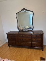 Front view of dresser with attached mirror