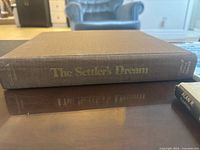 Spine view of The Settler's Dream hardcover