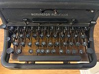 Top view showing keyboard layout and branding