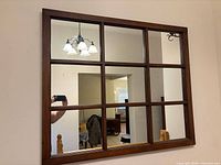 Front view of 9-pane mirror on wall