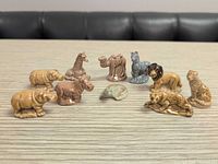 Group shot of all nine Wade ceramic miniatures