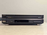 Front view showing Technics logo, 5-disc tray, controls, and display