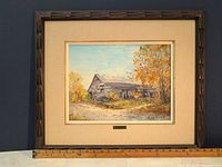 Framed oil painting front view with ruler for scale